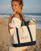 Model carrying the blue HOCl Tote bag